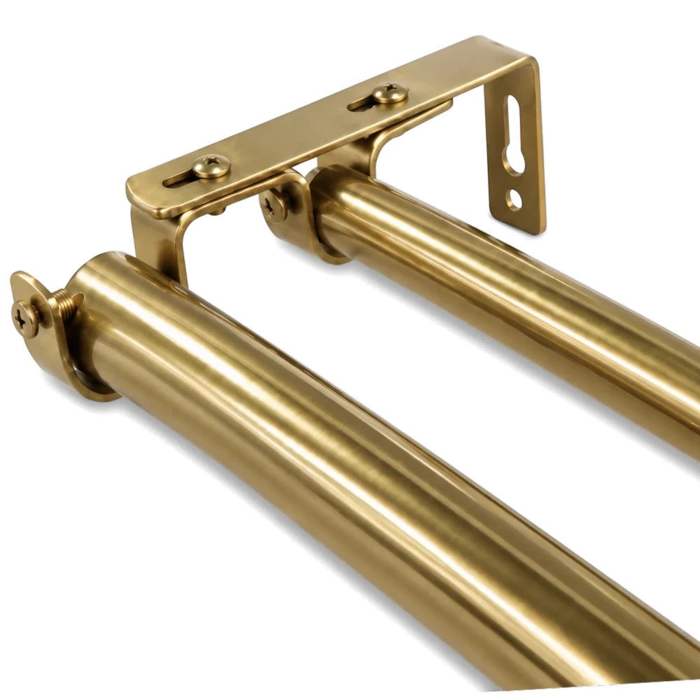 Close-up of a 16/25mm metal double bracket for curtain rods, featuring a shiny gold finish.