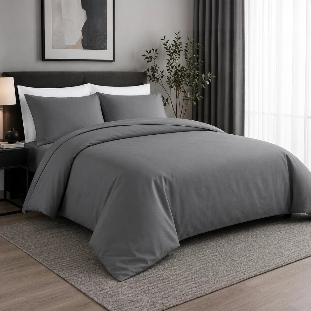 200TC 100% cotton percale plain duvet cover set in gray, with matching pillowcases, shown on a neatly made bed.