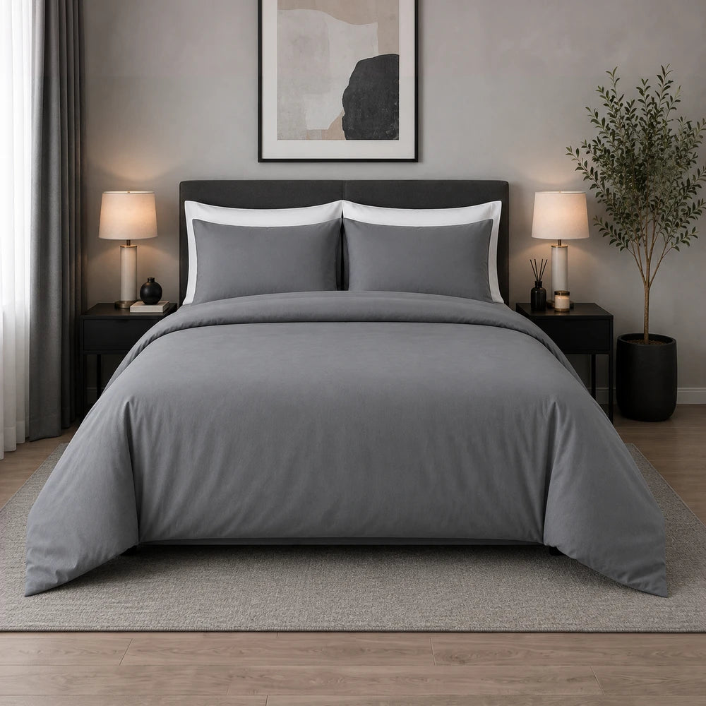 200TC 100% cotton percale plain duvet cover set in cool grey with matching grey and white-edged pillowcases.
