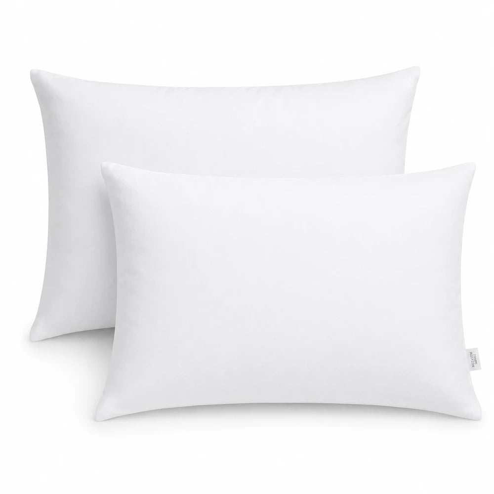 Two white standard pillowcases in 200TC 100% cotton percale, breathable and silky-smooth.