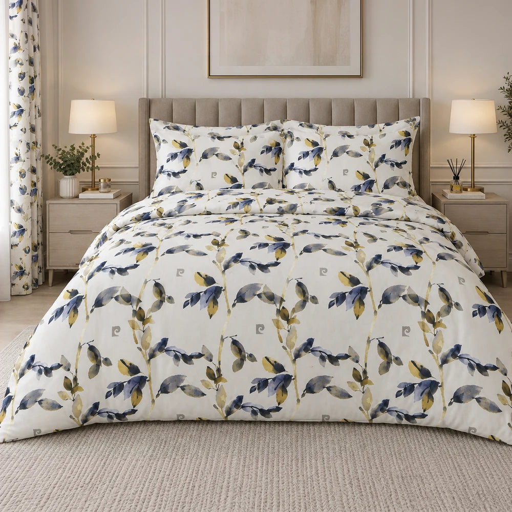 3 Piece Pierre Cardin Comforter set featuring a blue and yellow botanical print on a white background with matching