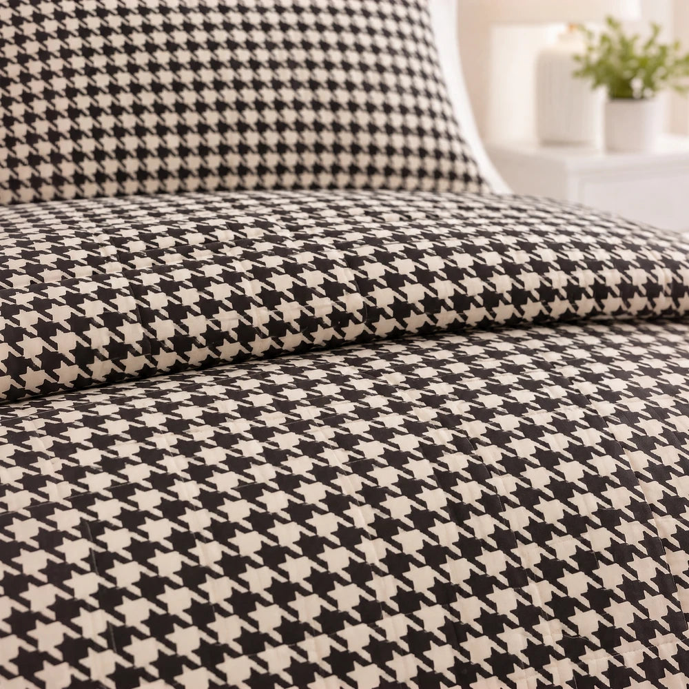3Pc Pierre Cardin Printed Houndstooth Quilt set in black and ivory with a classic houndstooth pattern and quilted texture.