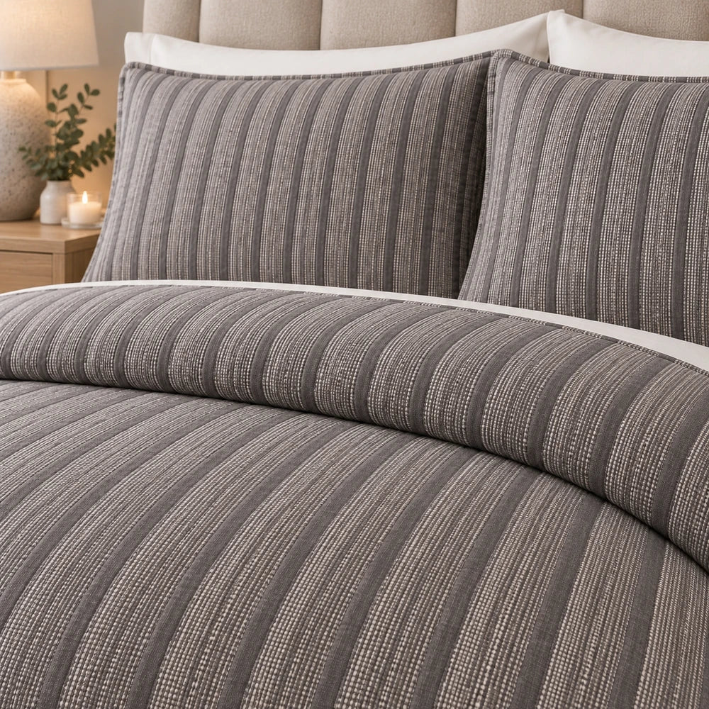 3Pc Pierre Cardin Textured Pinsonic Quilt in gray striped pattern with matching pillow shams, soft woven bedding.