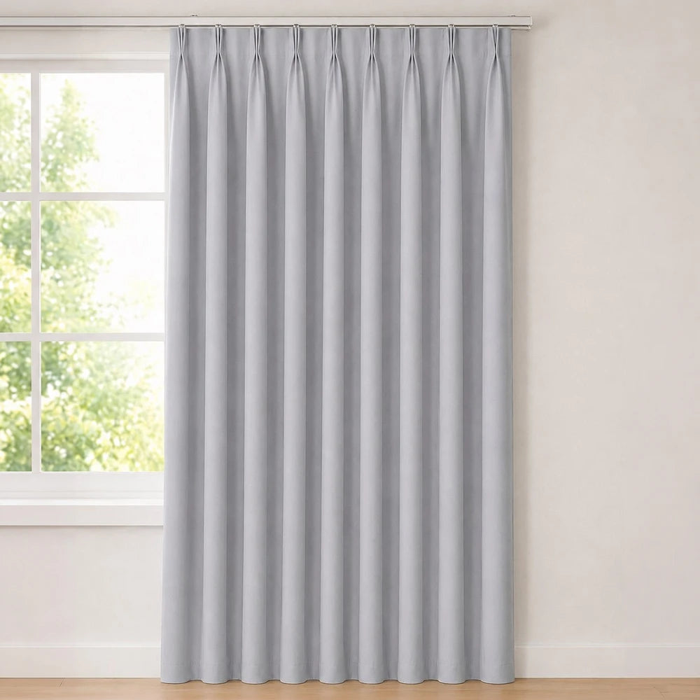 The Bahamas Unlined Taped Curtain in light gray with a smooth, soft drape and rod-pocket header.