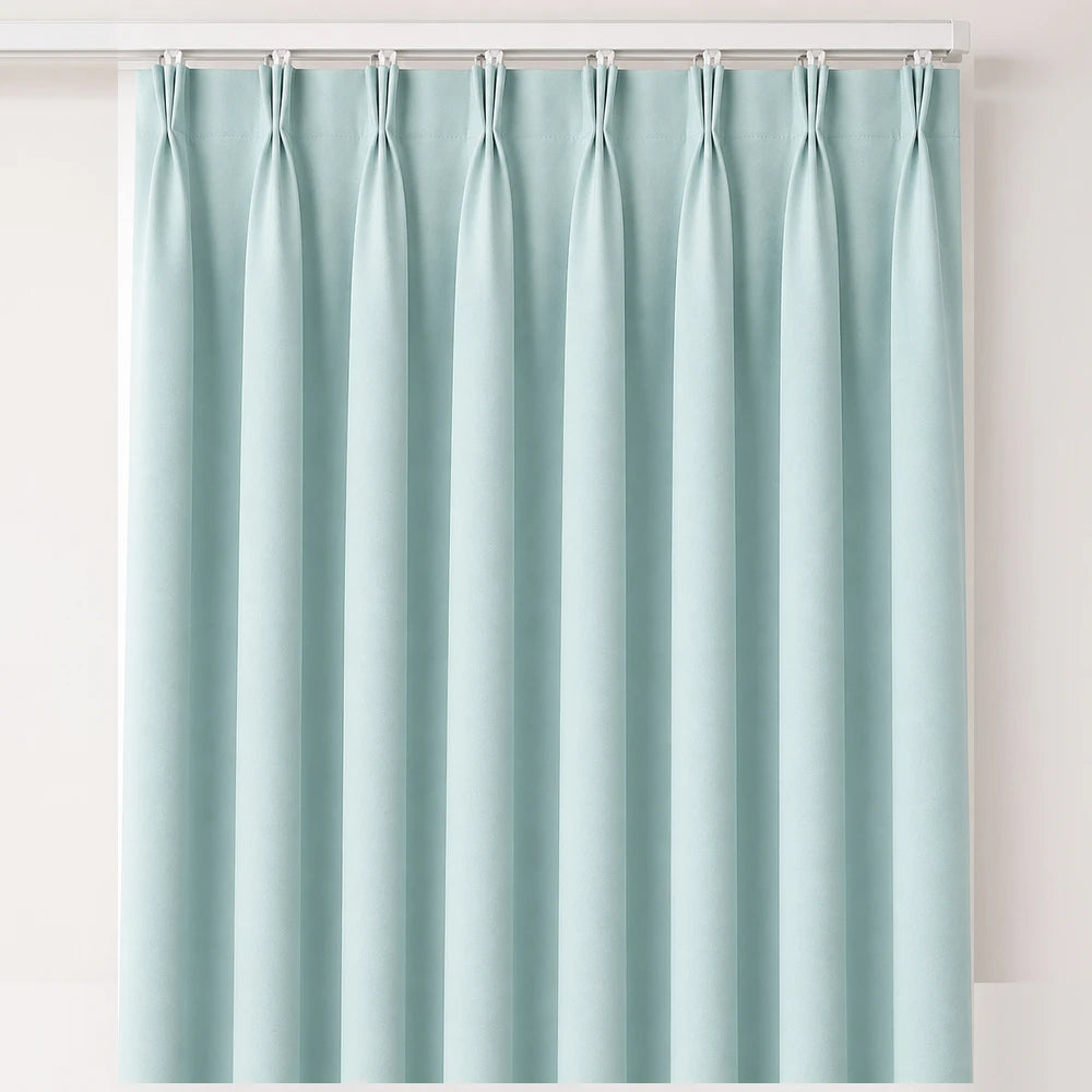 The Bahamas Unlined Taped Curtain in seafoam blue, unlined with a taped header for a soft, flowing drape.