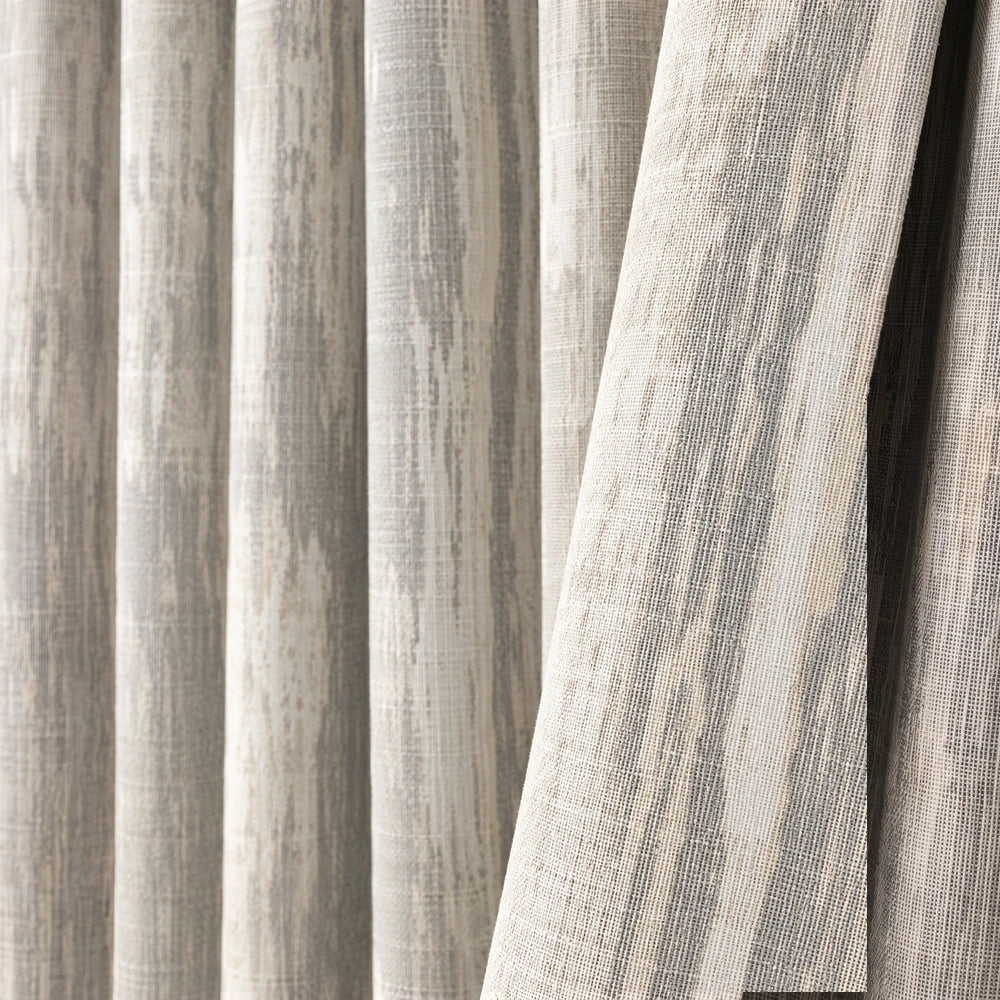 Barkweave Taped Lined Curtain in beige with a textured linen-like weave for a neutral, versatile window look.