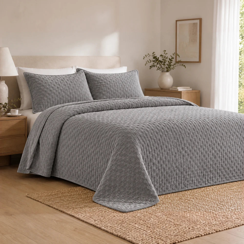 Carducci Velvet Pinsonic Quilt Set with Matching Storage Bag in gray, featuring a quilted texture and coordinating shams for