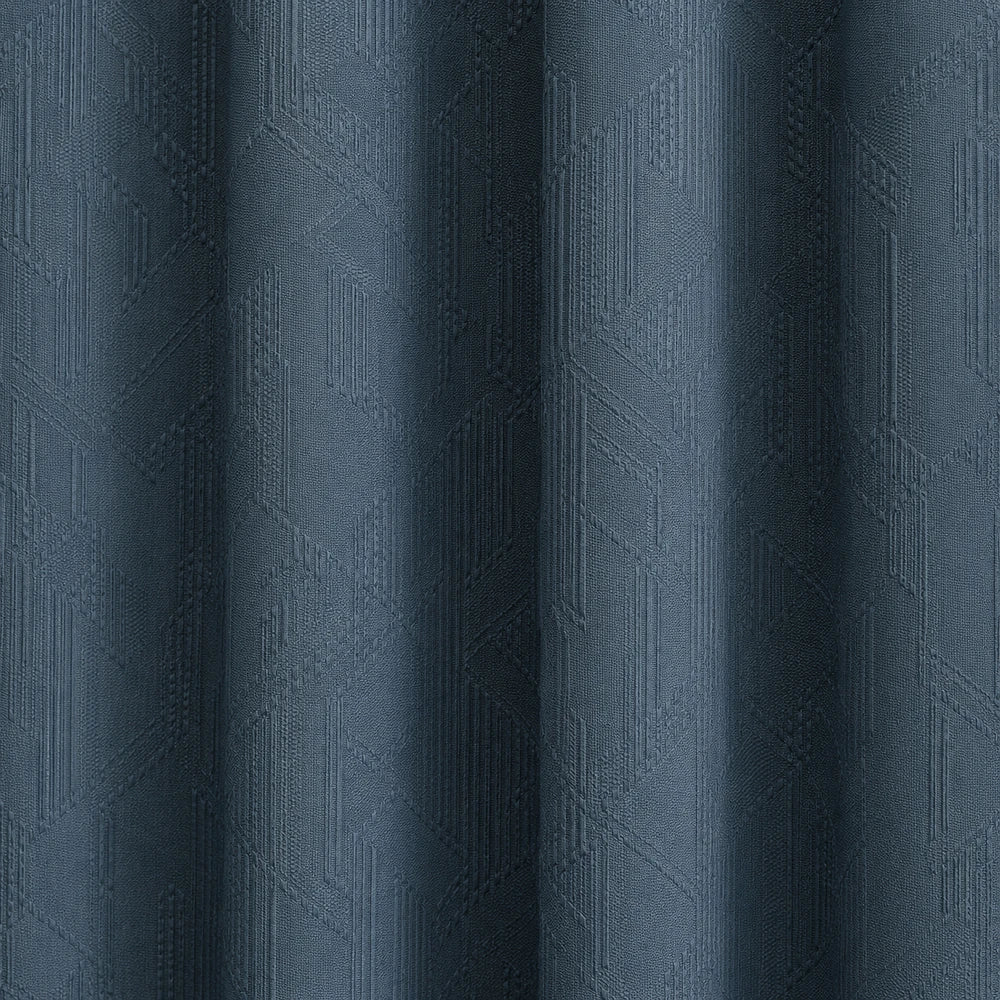 Carducci Velvet Textured Unlined Eyelet Curtain in deep blue with geometric jacquard pattern.