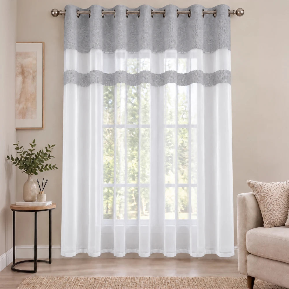 Cecile Balza Alter Eyelet Curtain with a gray textured top band and sheer white panels for soft light diffusion.
