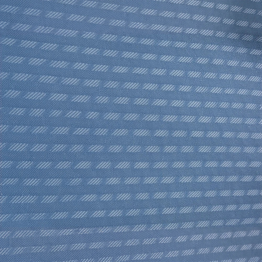 Charlie Textured Taped Lined Curtain in blue featuring a woven, striped texture for a subtle, modern look.