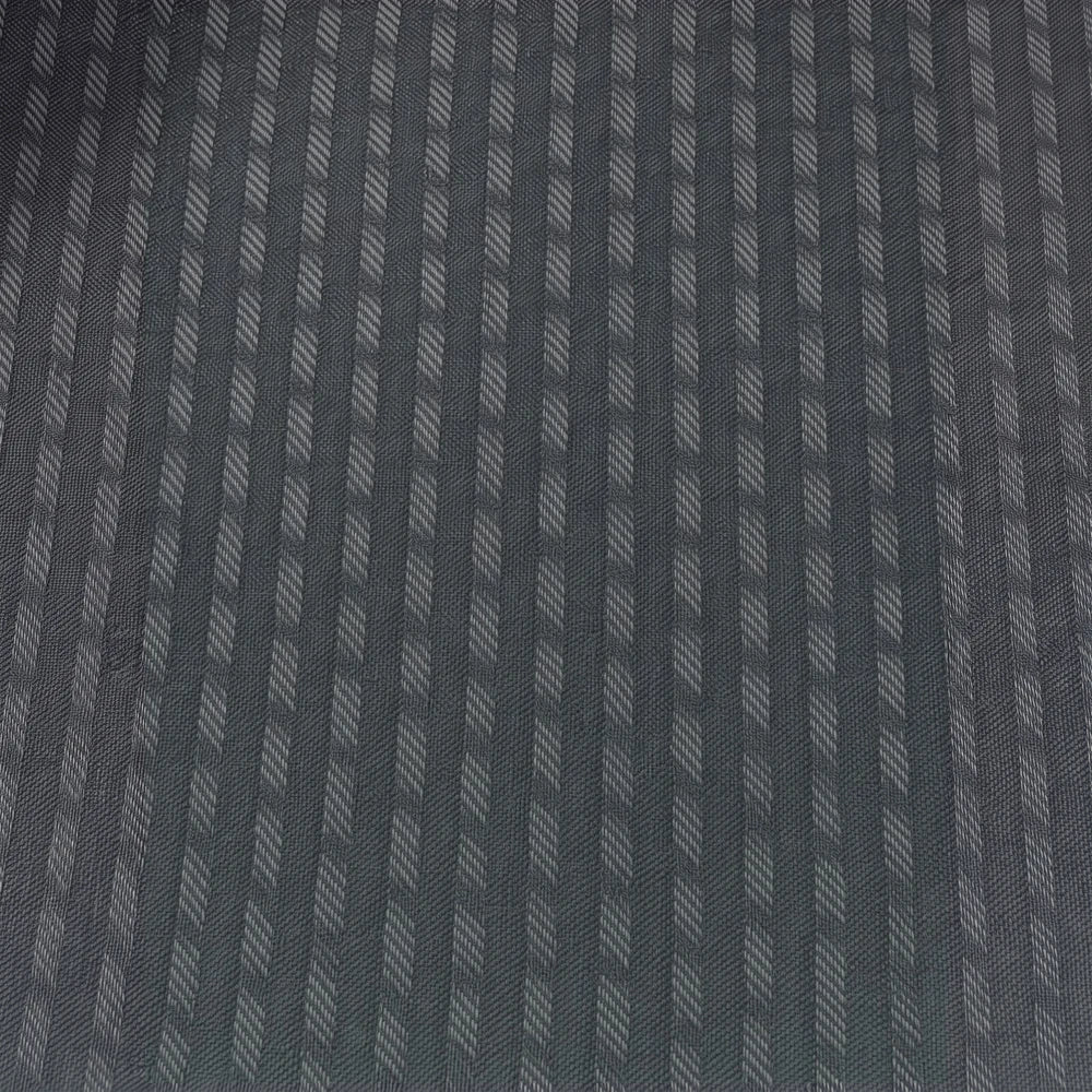 Charlie textured taped lined curtain in charcoal gray with a diagonal woven pattern and durable fabric for modern windows