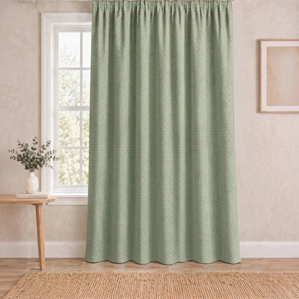 Charlie Textured Taped Lined Curtain in sage green with a subtle woven pattern, providing light control and privacy.