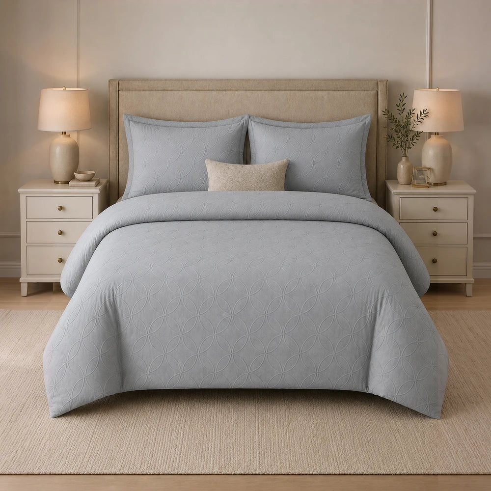 Cotton Co Ashley Duvet Cover Set in grey with a subtle geometric pattern; includes duvet cover and pillow shams.