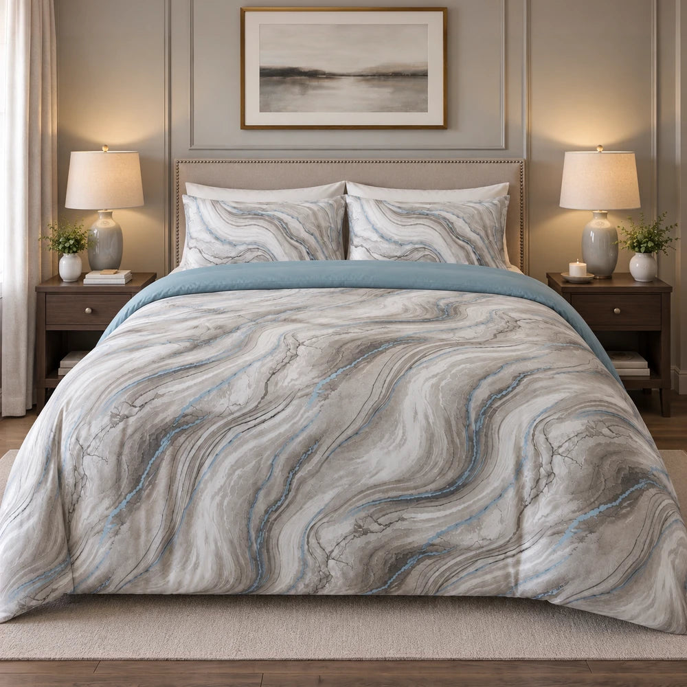 Cotton Co Premium Comforter Set in gray-blue marble pattern with matching pillow shams for a coordinated bedroom look.