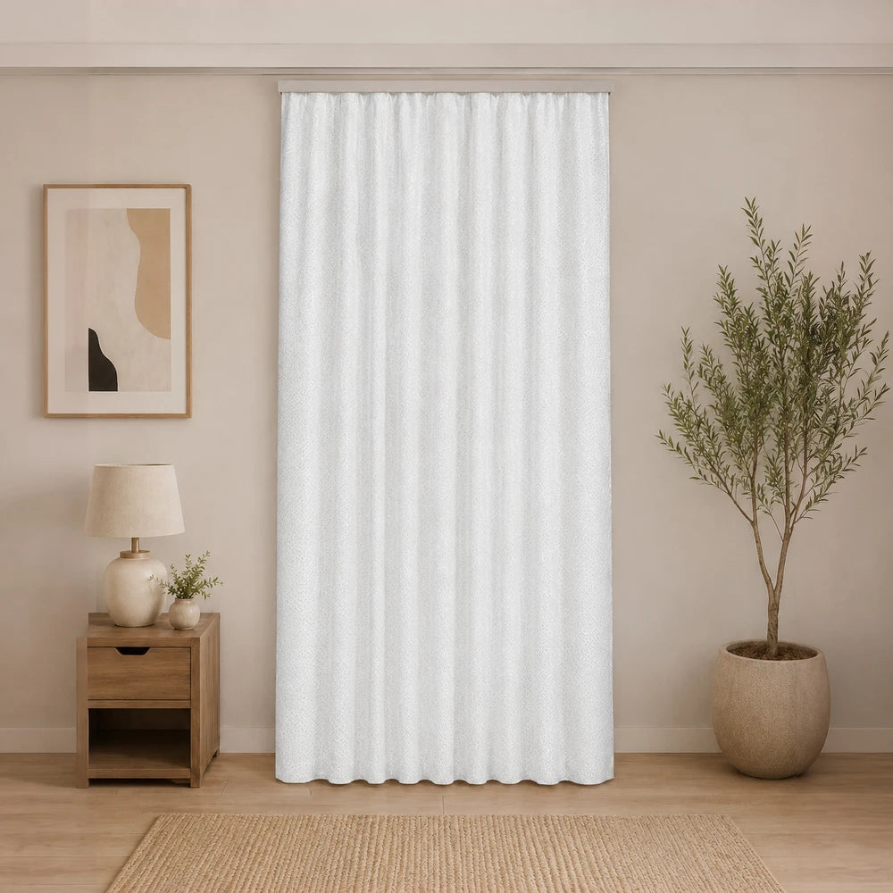 Dot textured unlined taped curtain in white with a subtle raised dot pattern, suitable for living room or bedroom windows.