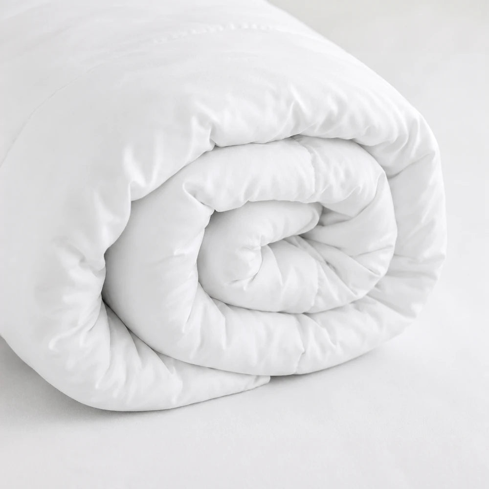 Eco-fibrefill duvet inner in white, lightweight and breathable with soft quilted fill ready to insert into a duvet cover.