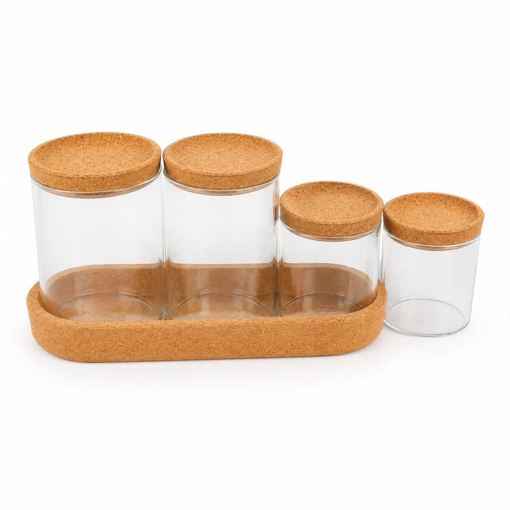 Elegant 4-piece glass storage jar set with cork lids and a wooden organizer tray for pantry storage