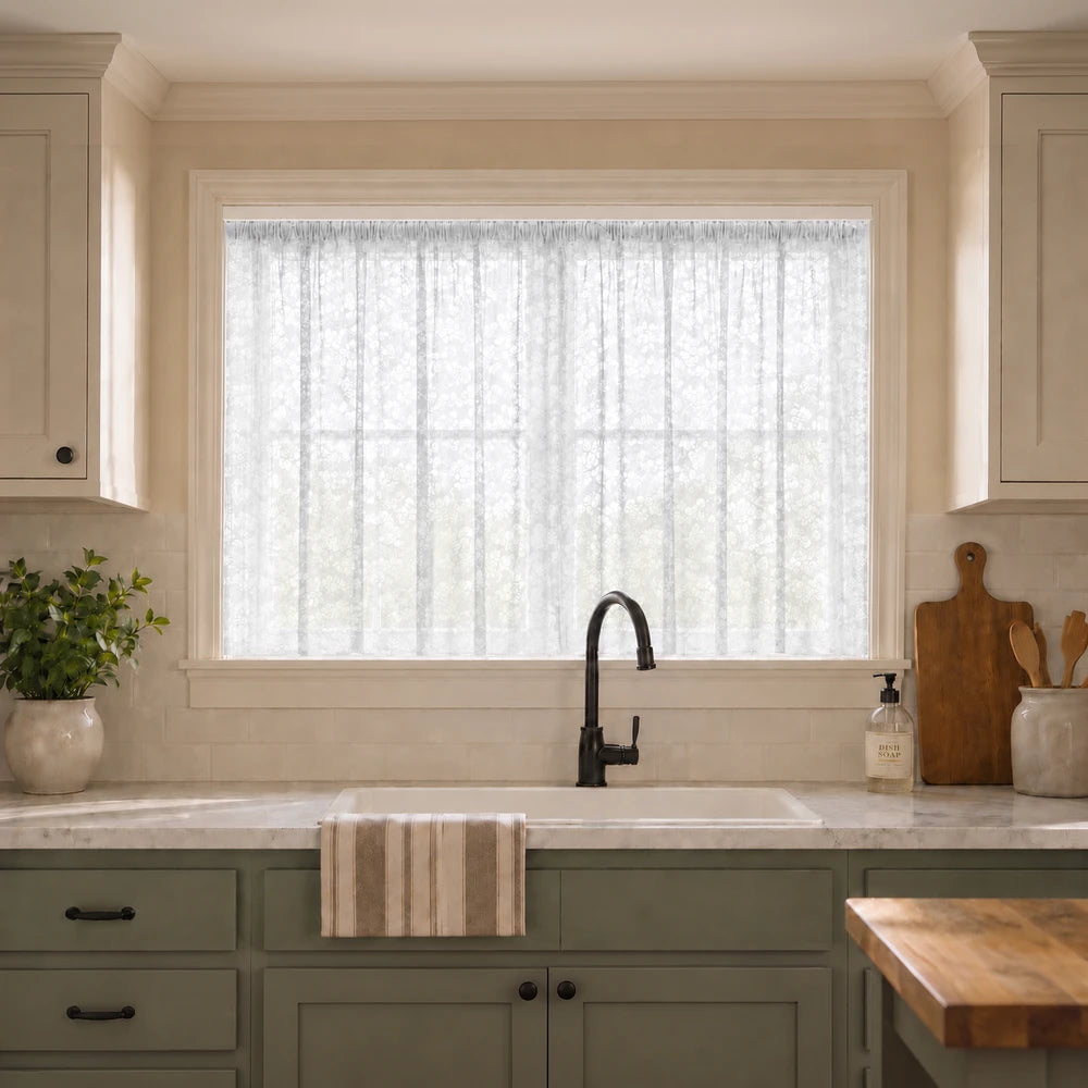 Hope Lace Taped Curtain 250 x 120cm in white lace with a taped header, shown over a kitchen window for a soft,