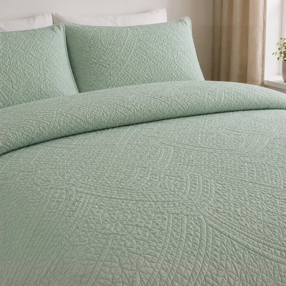 Horrockses Harmony 3D embossed scalloped duvet cover set in sage green, quilted texture with matching pillowcases