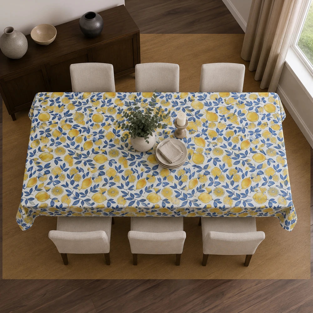 Linen Look Table Cloth featuring a lemon and blue leaf pattern on a white background.