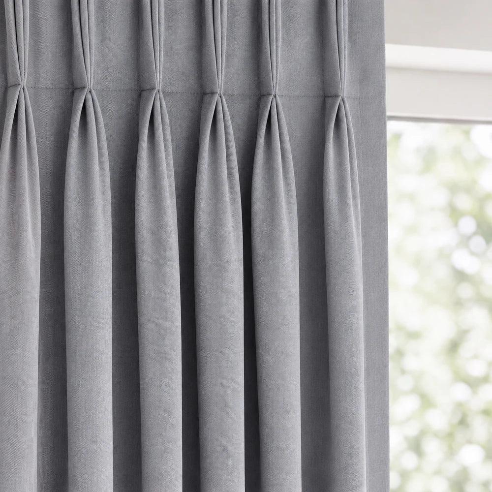 Linen-Look Unlined Taped Curtain in soft gray with a pleated taped header and flowing drape for a neutral window treatment.