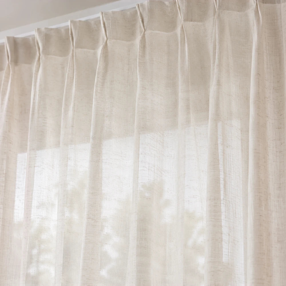 Linen Sheer 5m taped curtain in natural beige, lightweight translucent fabric for soft filtered daylight.