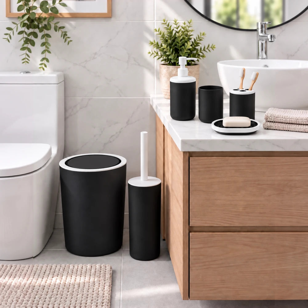 Minimalist 6-piece bathroom organizer set in black with white accents, includes dispenser, toothbrush holder, soap dish, and