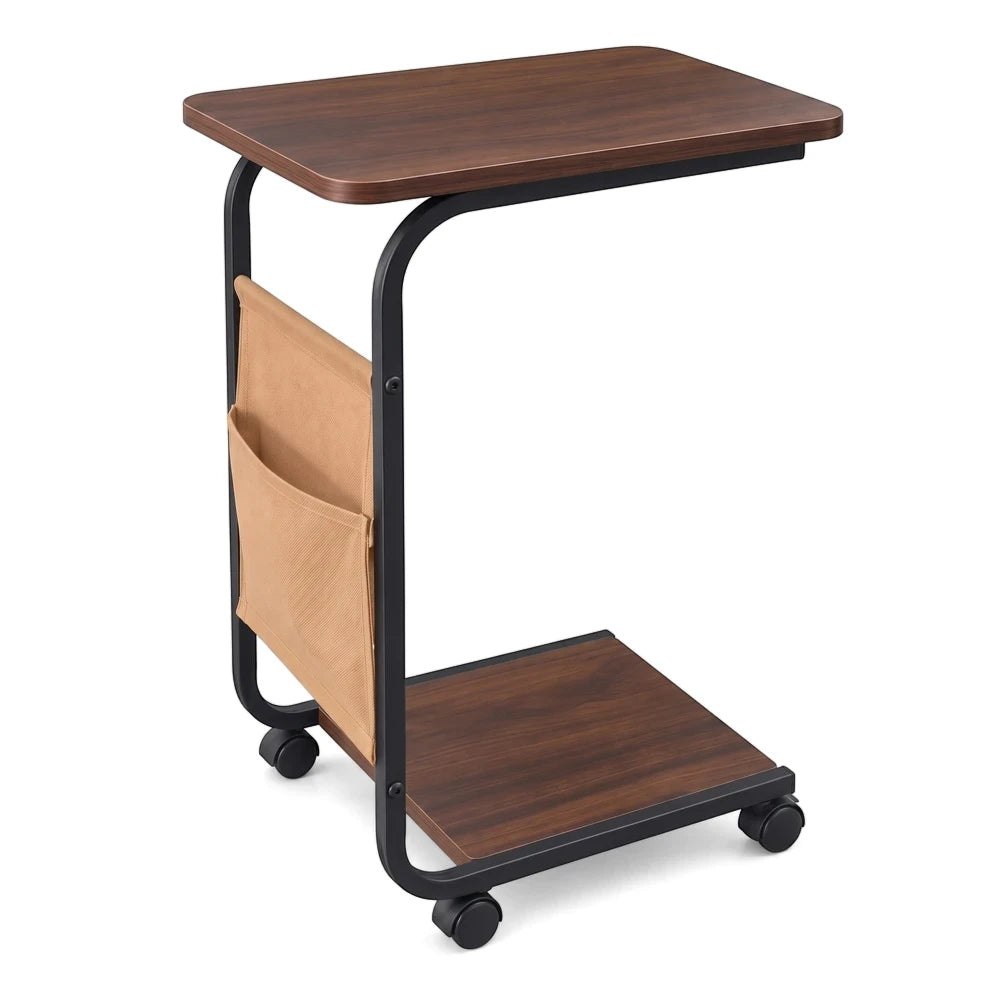 Modern wooden trolley table with a C-shaped black metal frame, a brown top, and a beige fabric storage pocket.