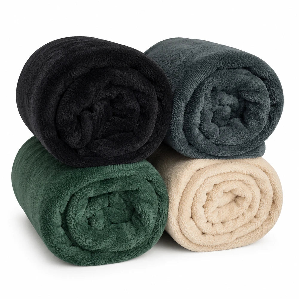 Pierre Cardin Classic Woven Throw shown as rolled bundles in black, teal, green and beige plush fabric.
