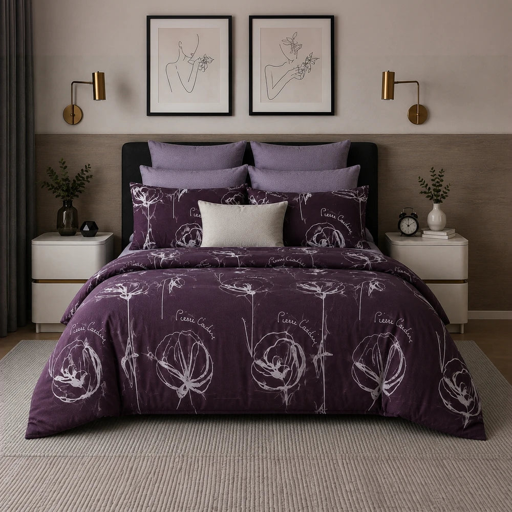 Pierre Cardin 3 Piece Comforter Set in deep purple with white floral pattern, including matching shams and a beige