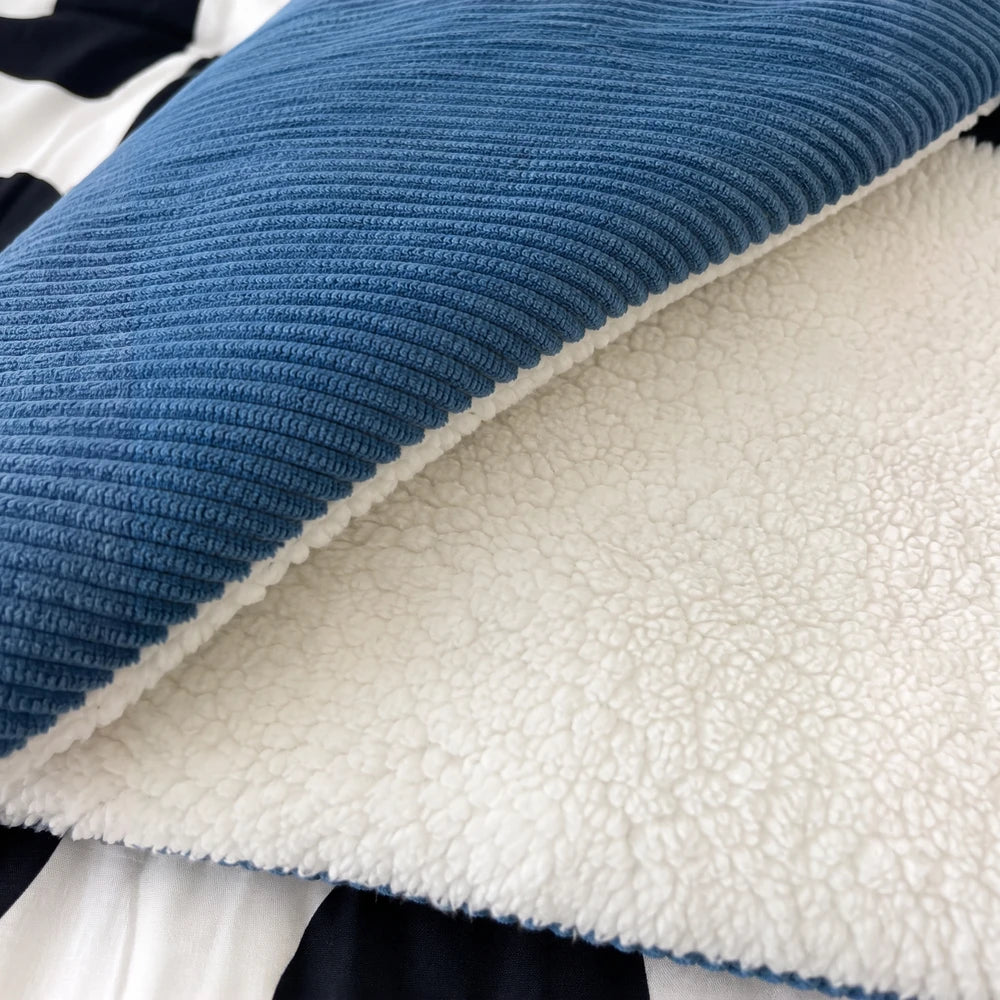 Pierre Cardin corduroy sherpa throw in blue with white sherpa backing, plush blanket for sofa and cozy warmth