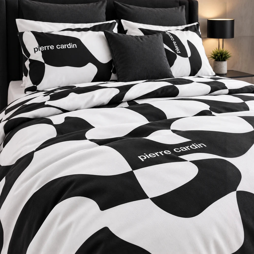 Pierre Cardin duvet cover set in black and white abstract pattern with subtle logo, designed for modern bedrooms.
