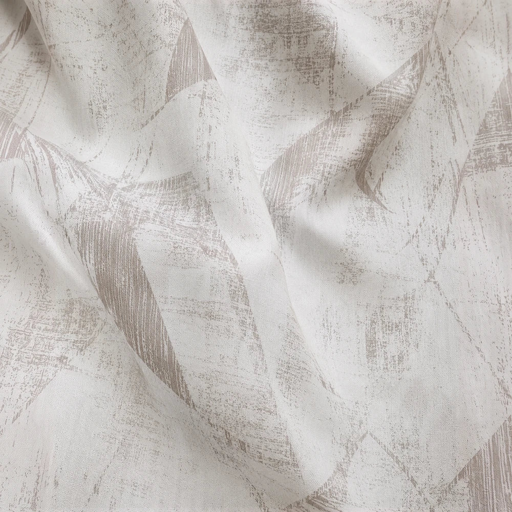 Pierre Cardin Eyelet Lined Jacquard Curtain in cream beige with subtle abstract jacquard pattern.