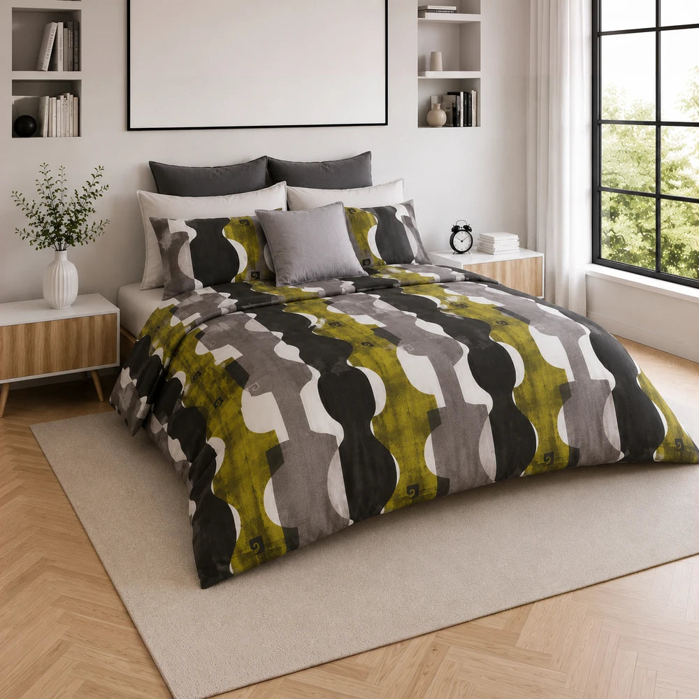 Pierre Cardin Microfibre Cover Set Branson with olive, grey and black abstract pattern on bed