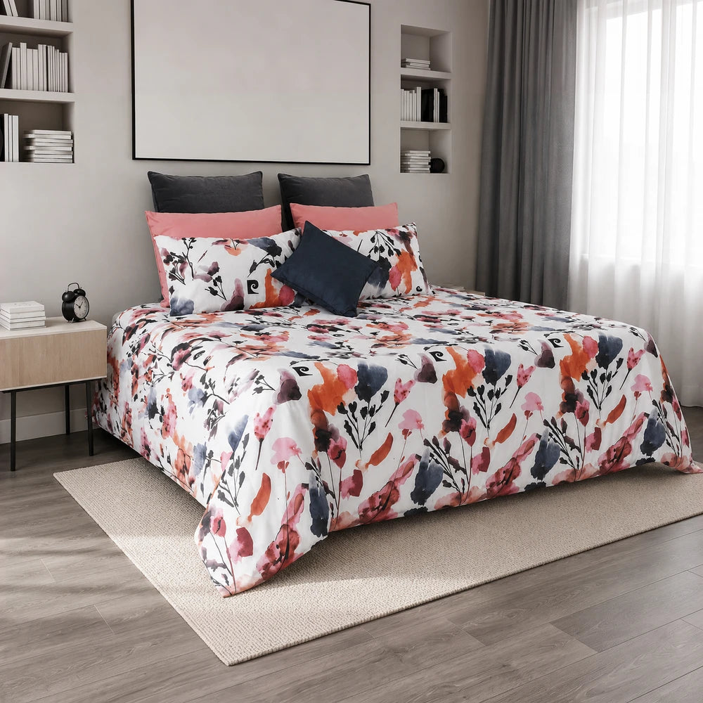 Pierre Cardin Microfibre Duvet Cover Set Lydia Floral in white with pink, coral and navy floral pattern.