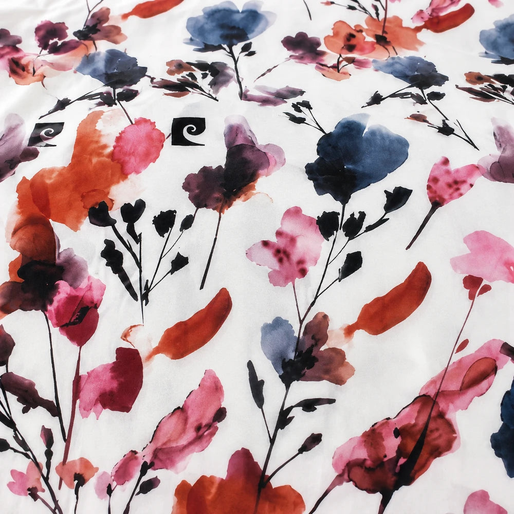 Pierre Cardin Microfibre Duvet Cover Set Lydia Floral with pink, red, orange and blue flowers on a white background.