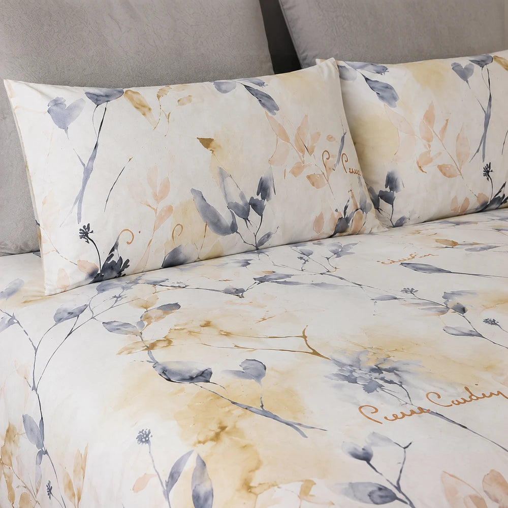 Pierre Cardin Microfibre Duvet Cover Set Peyton with a watercolor beige and blue floral pattern across the duvet and