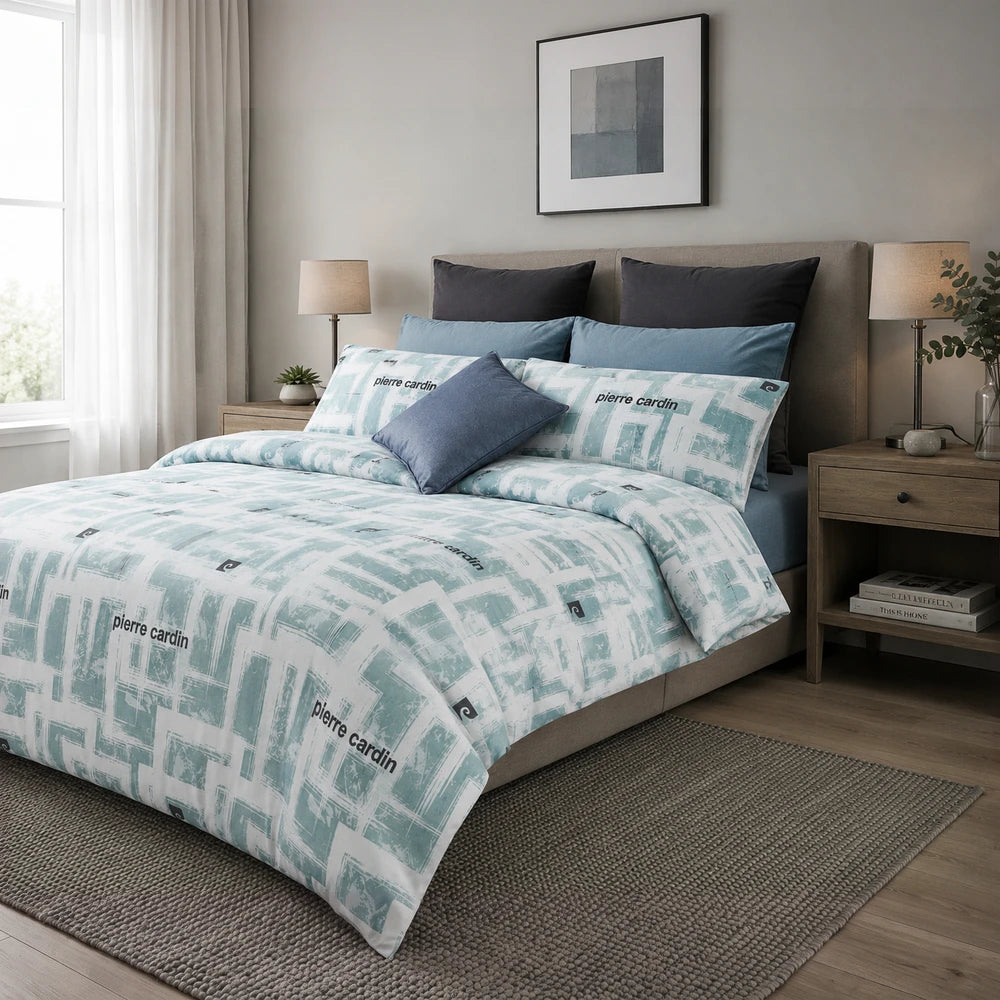 Pierre Cardin Microfibre Duvet Cover Set in teal geo brushstroke print with matching pillow shams and blue accent pillows