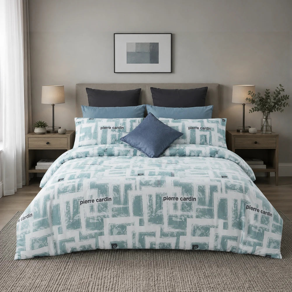 Pierre Cardin microfibre duvet cover set in teal with a geometric brushstroke pattern, lightweight and soft with