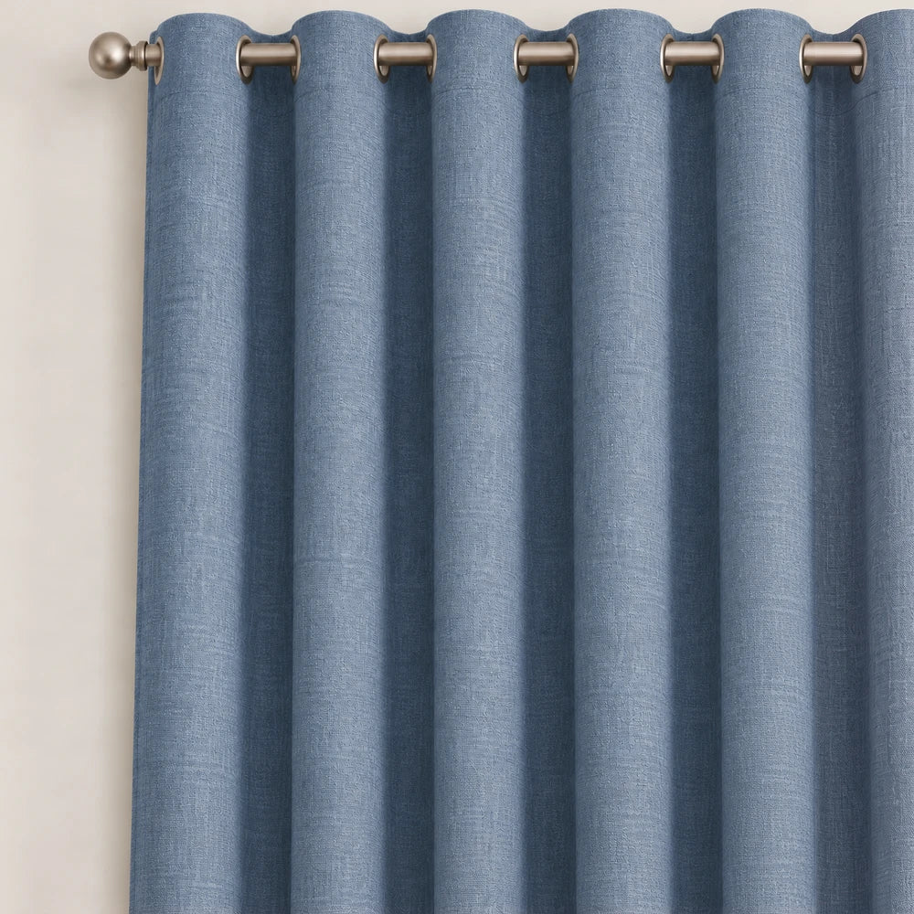Pierre Cardin Microlinen Eyelet Lined Curtain in soft blue with metallic eyelets for easy hanging.