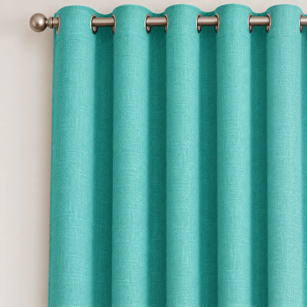 Pierre Cardin microlinen eyelet lined curtain in turquoise with a grommet header and textured drape for a polished window