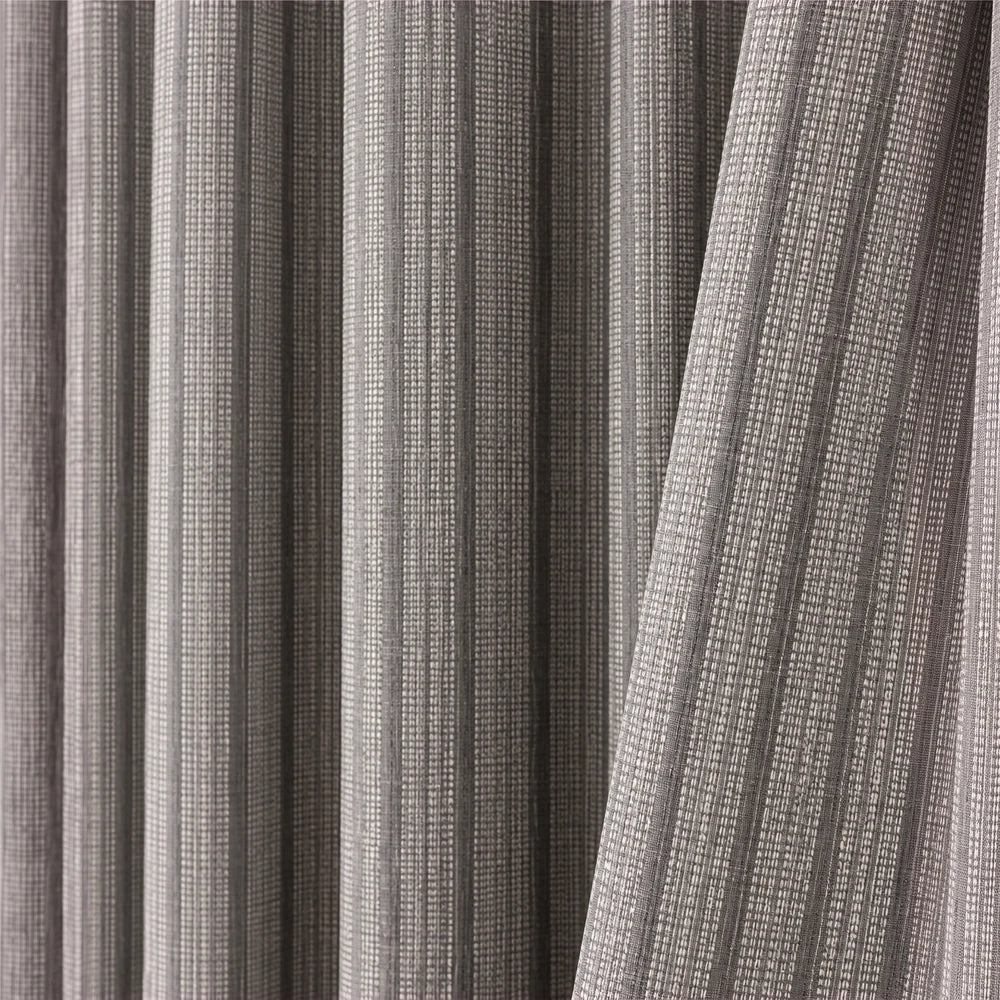 Pierre Cardin taped lined curtain in Quarry gray with a vertical striped texture, suitable for living room or bedroom windows