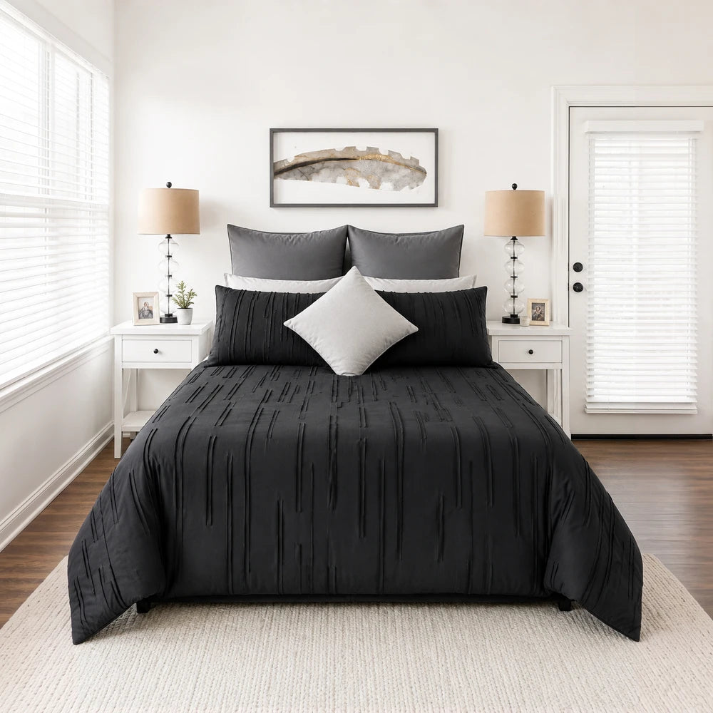 Pierre Cardin Trufted Stripe Duvet Cover in black with vertical stitched stripes, showcased on a neatly made bed.