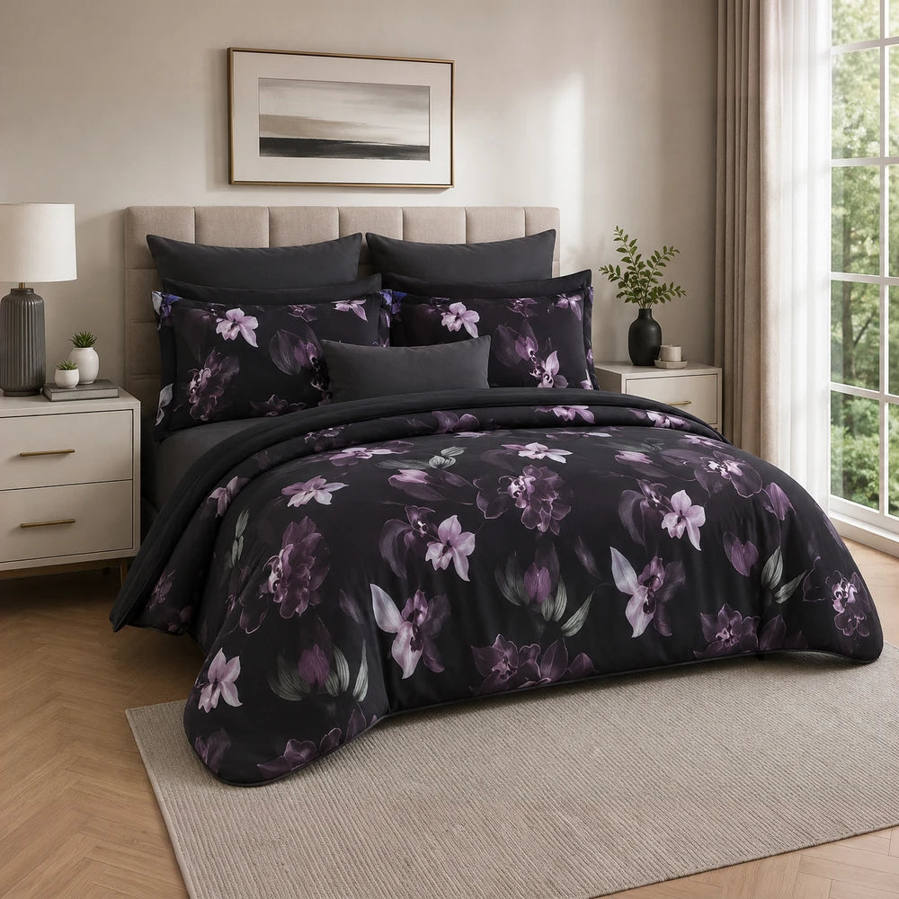 Pierre Cardin Vogue Duvet Cover Set in noir botanical featuring purple floral pattern on black background, luxurious bedroom