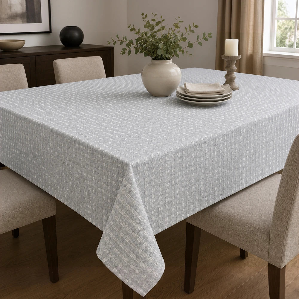 Premium 4-6 seater Charlie textured tablecloth in pale blue with a subtle geometric pattern, ideal for everyday dining and