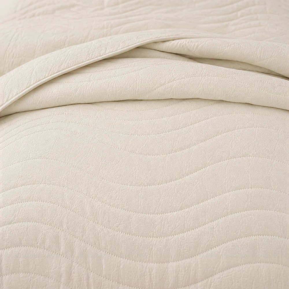Premium Carducci Wave Pattern 100% Cotton Quilt in beige with a seamless wavy quilt design, showcasing soft texture and cozy