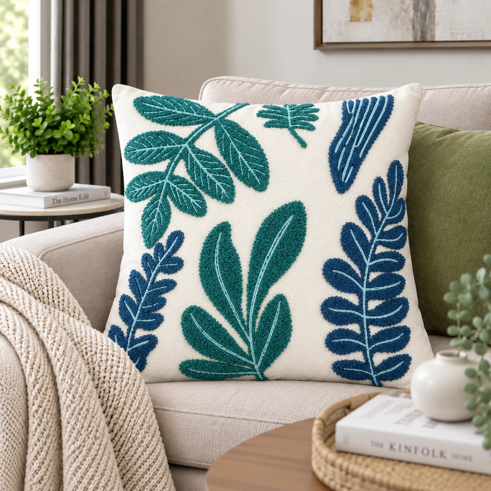 Premium Polycotton Scatter Cushion Cover featuring teal and navy embroidered leaf patterns on a cream backdrop.