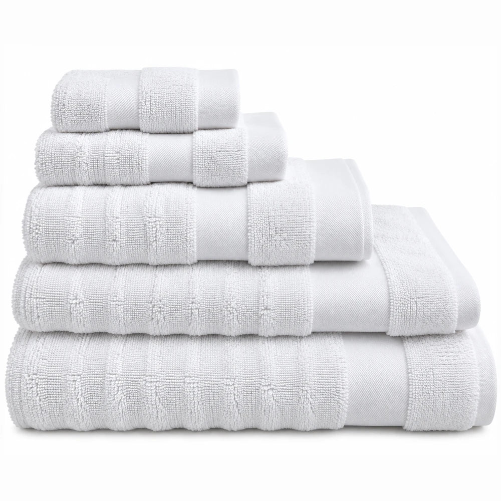Premium Ribbed Zero Twist Cotton Towels in white, 500GSM, stacked to show ribbed pattern and plush softness.