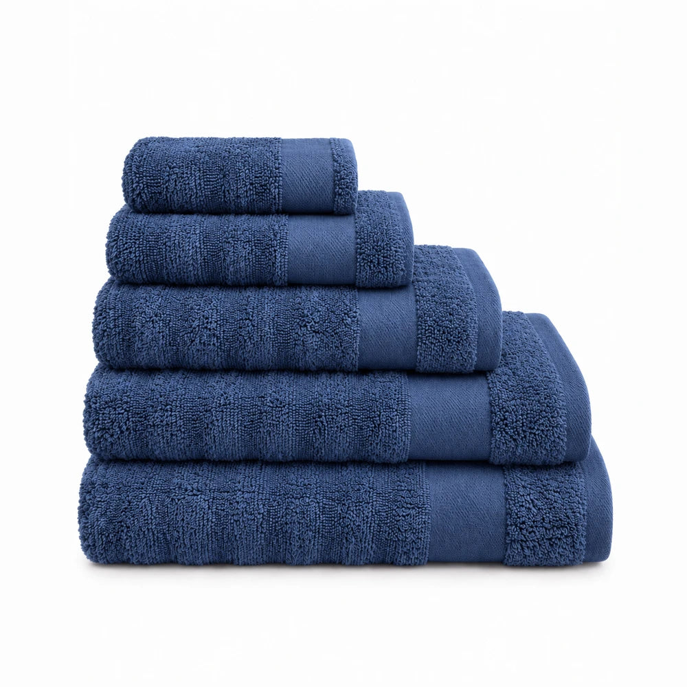 Premium ribbed zero-twist cotton towel set in deep blue, 500GSM, plush and highly absorbent.