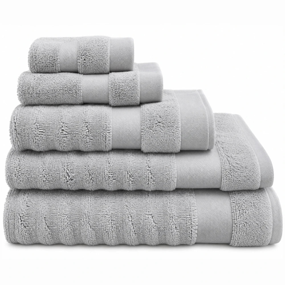 Premium Ribbed Zero Twist Cotton Towels in gray, 500GSM, stacked to highlight ribbed texture and plush absorbency.